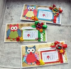 three cards with owls on them are sitting next to each other, one has a calendar and the other has a bow