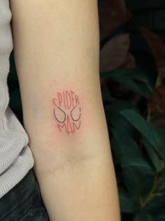 a person with a tattoo on their arm that reads pride and has two hearts in the middle