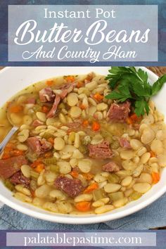 instant pot butter beans and country ham soup in a white bowl with a spoon on the side