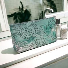 "Monstera Bag Canvas Zippered MakeUp Bag Zipper Pouch Tropical Leaf Print Bag Organizer Green Denim lined zippered makeup bags featuring printed artwork. Made from durable canvas with YKK zipper and inner pocket, there's many ways you can use your printed makeup bag.  Variations: 2 Sizes - Small 10\" and Large 12\" 2 Zipper Colors Black and White Choice of Zipper Pulls Black, White or No Pull Features: -Denim Lined: Indigo demin lining provides a soft structure for your carry-all. -Vibrant print Funny Makeup Bag, Green Stockings, Printed Makeup Bag, Canvas Cosmetic Bag, Green Purse, Tropical Leaf Print, Stocking Tree, Bag Organizer, Purse Organization