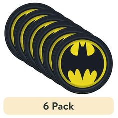 a set of six batman coasters with yellow and black logos on each one side