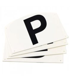 three white parking signs on top of each other, one with the letter p in black