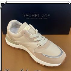 Elevate Your Sneaker Game With These Rachel Zoe Retro Sneakers. In A Fresh Taupe And Tan Colorway, These Athletic Shoes Are Perfect For Any Fashion-Forward Woman. The Sneakers Feature A Man-Made Upper Material And A Comfortable Sneaker Style, Making Them Both Stylish And Practical. With A Size Of 9.5, These Sneakers Are A Great Fit For Any Woman. The Rachel Zoe Retro Sneakers Are Brand New With Tags, Beige Slip-on Sneakers For Everyday, Trendy Beige Sneakers For Everyday, Trendy Everyday Beige Sneakers, Trendy Beige Everyday Sneakers, Trendy Beige Sneakers With Perforated Toe Box, Beige Sneakers With Cushioned Footbed For Everyday, Beige Everyday Sneakers With Cushioned Footbed, Beige Cushioned Sneakers For Everyday Use, Trendy Brown Sneakers For Everyday