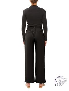 Step into a world of refined sophistication with the All-Day Elegance Trousers – a perfect blend of timeless style and modern comfort. These wide-leg, high-waist dress pants effortlessly elevate your wardrobe, offering versatility for any occasion. Crafted with meticulous attention to detail, these trousers feature a tailored fit that complements the figure, while the high-waist design adds a touch of classic elegance. The elastic back ensures a comfortable and customizable fit, allowing you to High Waisted Dress Pants, Curvy Shorts, Curvy Jeans, Sweater Tank Top, Skirt Leggings, Athletic Pants, Long Blouse, Sweater Blouse, Event Dresses