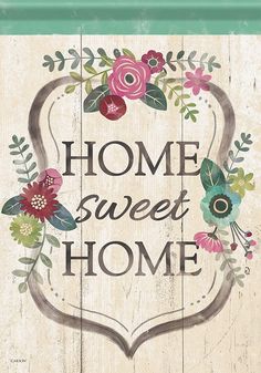 a wooden sign that says home sweet home with flowers on the front and side of it