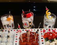 an assortment of appetizers are displayed on a table