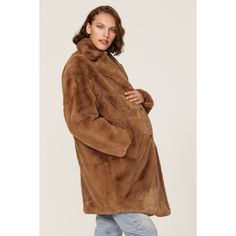 Brown faux fur (50% Recycled Fabric, 50% Polyester). Shearling. Long sleeves. Front button closure. 37" from shoulder to hemline. Imported. Faux Fur Coat With Faux Fur Lining, Oversized Fur Coat With Faux Fur Lining For Fall, Oversized Faux Fur Lined Coat For Fall, Fluffy Brown Fur Coat For Cold Weather, Cozy Fall Fur Coat With Faux Fur Trim, Shearling Fur Coat With Faux Fur Trim For Fall, Fall Sheepskin Fur Coat With Faux Fur Lining, Faux Fur Trim Shearling Coat For Fall, Mink Colored Faux Fur Coat