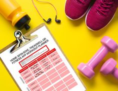 a clipboard with a workout plan on it next to dumbbells and a pair of pink shoes