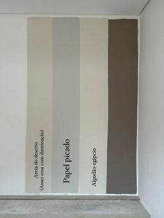 the walls are painted in different shades of gray and white, with some brown on each side