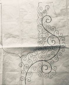 a piece of paper with an intricate design on it