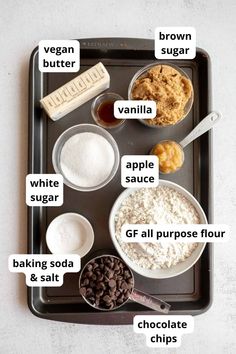 an image of ingredients on a tray for making chocolate chip cookie bars with words labeled in english