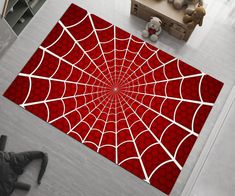 a spider web rug on the floor in a living room