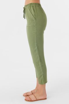 Ready for anything woven pant that has a lightweight, comfortable feel, solid color wash and elastic waist with drawcord. O'Neill Women's woven pant 27 1/2" inseam length 10 3/4 Front rise Elastic waistband with drawcord Straight leg fit 100% Viscose twill