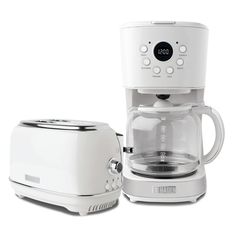 a white coffee maker and toaster sitting next to each other