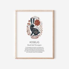 a framed poster with the words kosselig and an image of a rabbit in flowers