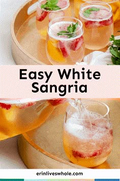 easy white sangria recipe with lemons and strawberries in glasses on a tray