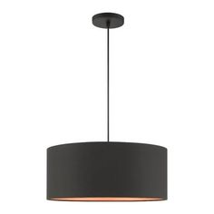 a black lamp hanging from the ceiling with a round light fixture on top of it