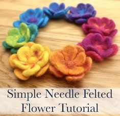 the simple needle felt flower is made with colored yarn and has five petals on each side