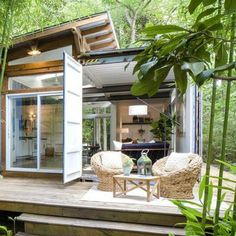 an outdoor living area in the woods