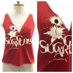 a red shirt with the words sugar on it and an image of a sunflower