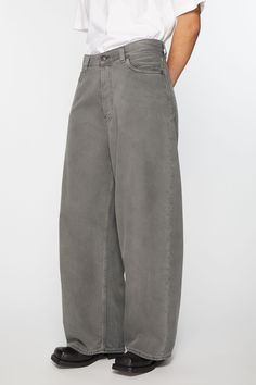 2023 jeans are cut to a super baggy fit with a mid waist, super wide leg and long length. Crafted from non stretch denim in an anthracite grey wash. Acne Studios 2023F FN Saxon Gray Wide Leg Washed Jeans, Gray Washed Wide Leg Jeans, Gray Relaxed Fit Wide Leg Jeans, Gray Wide Leg Jeans For Fall, Oversized Washed Wide Leg Pants, Oversized Washed Wide Leg Jeans, Oversized Wide Leg Washed Pants, Oversized Wide Leg Washed Jeans, Gray Oversized Straight Leg Bottoms