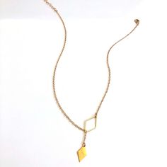 Geometric Lariat Necklace Gold Metal Tone Clasp Closure Material: Alloy Length: 17.7-19.7" This Minimalist Design Adds A Touch Of Sophistication To Any Outfit. The Y-Neck Style Is The Perfect Way To Accentuate The Neckline, Drawing The Eye Upward To Elongate The Neck. Pair With A V-Neck Blouse Or A Plunging Neckline Dress For A Bold Look! Minimalist Gold-tone Lariat Necklace, Gold-tone Metal Lariat Necklace Gift, Gold Plated Lariat Necklace, Tarnish Resistant, Adjustable Gold-tone Lariat Necklace, Gold-tone Lariat Necklace With Adjustable Length, Dainty Bar Necklace, Layered Cross Necklace, Juicy Couture Charm Necklace, Anthropologie Necklace