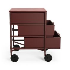 a red cart with three drawers on wheels