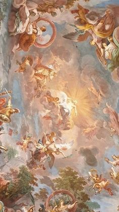 an ornate painting on the ceiling of a building with angels and cherubs painted all over it