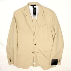 97% Cotton 3% Elastane 2 Button Jacket Center-Vented Rear Solid Tan Slim Fit New With Tags. Half Lined, Fused Construction 40s - Tagged Size 40s - Measured Size Measurements As Follows: 41.5” (20.75" Armpit To Armpit) Chest 38” Waist 17.75” Shoulder Width 25” Sleeve 28" Jacket Length - Measured From Bottom Of Collar 2.75” Lapel Classic Slim Fit Sport Coat For Spring, Fitted Cotton Button-up Sport Coat, Spring Classic Slim Fit Sport Coat, Charcoal Blazer, Slim Blazer, Fitted Blazer Jacket, Mens Sport Coat, Cotton Blazer, Button Jacket