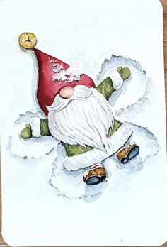 a watercolor painting of a santa clause laying on the ground