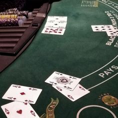 a casino table with playing cards on it