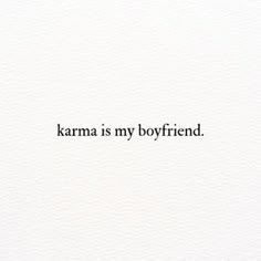 the words karma is my boyfriend written in black ink