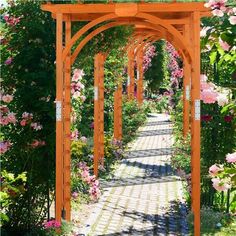 an artist's rendering of a garden with pink flowers on the arbor and brick walkway