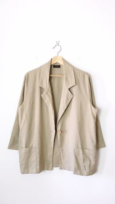 "Vintage Women's Ecru Slouchy Light Blazer/Minimal Jacket. Measurements Length : 28\" Armpit to armpit : 21\" Shoulder: 16 1/2\" Shoulder to end of sleeve: 20\" Condition: Gently used. There's no stains or holes. Good condition. ※Please read the policy before you purchase※" Beige Button-up Summer Outerwear, Beige Button-up Summer Blazer, Summer Beige Button-up Outerwear, Oversized Cream Blazer For Spring, Summer Beige Button-up Blazer, Oversized Beige Outerwear For Summer, Beige Lapel Collar Blazer For Everyday, Oversized Beige Blazer With Button Closure, Beige Blazer With Lapel Collar For Everyday