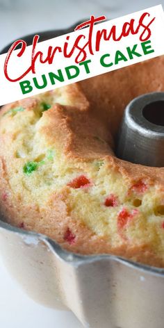 a bundt cake in a pan with a christmas sticker on it's top