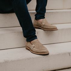 The Wilson Tan Fall Moc Toe Slip-ons With Rubber Sole, Fall Slip-on Loafers With Moc Toe, Beige Suede Slip-ons With Suede Lining, Casual Suede Slip-ons With Brogue Detailing, Suede Slip-ons With Suede Lining, Beige Suede Slip-on Moccasins, Modern Slip-on Tassel Loafers With Brogue Detailing, Modern Tassel Loafers With Brogue Detailing, Fall Loafers With Textured Sole And Moc Toe