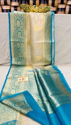 Material Semi Kora Organza Dimensions Length: 5.5 Metres Description PRODUCT DETAILS : Saree Type : Banarasi Semi Kora Organza Saree Length : 5.5 Meters blouce leanth... 0.90 metres Saree Weight : 0.650 gms Color : As shown in the picture Work : weaving Occasion: Party Wear, Formal Wear, Festival Wear , Marrige Function Wear, Casual Wear, Regular Use. Washing Instructions : Dry Clean only. Disclaimer : The color of actual product may vary slightly from the images provided due to photographic lig Traditional Wedding Saree, Kora Organza Sarees, Saree Patola, Organza Sari, Banarasi Sari, Cotton Saree Blouse, Saree Floral, Floral Saree, Handloom Weaving