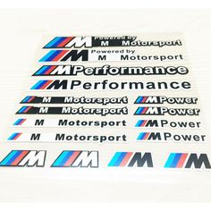 stickers on the side of a white car that says m performance and m motorsports power