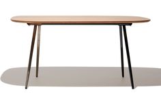 a wooden table with two black legs and a light brown top, against a white background