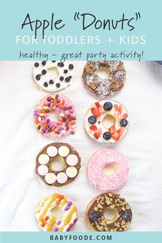 a group of donuts sitting on top of a white table