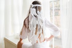 "Feather headpiece, Beautiful Feather Veil, White feather veil. READY TO SHIP (tracking number provided) Package will be marked as \"gift\" ✅Head circumference: 20-21 inches ( aprox. 51-54 cm) 🌺More to choose from right here: https://www.etsy.com/shop/BohoWeddingPartyShop?ref=seller-platform-mcnav&section_id=38108644 If you want something similar in different colors or size, just send me a message with your ideas. ✅ Estimated shipping times: United States: 2-3 weeks Europe: 1-2 weeks Canada: 3- Macrame Hair Veil, Feather Veil, Bohemian Veils, Boho Veil, Boho Veils, Boho Headpiece, Feather Headpiece, Feather Headband, White Feather