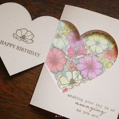 two heart shaped cards with flowers on them, one has a happy birthday card in the middle