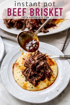 the instant pot beef brisket is being served with mashed potatoes and gravy