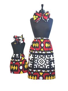 Coordinated Mommy and Me looks with these red Ankara Angola print African skirts, featuring a striking red geometric print which includes vibrant yellow and black.       Crafted from a lightweight African-inspired fabric, these skirts boast professionally finished seams and unique pattern placement.  Embrace the perfect opportunity to twin with your little one this Mother's Day. Please note, for sizes XXL and up, the pattern will fall vertically instead of horizontally. Head wraps are optional. See drop down for options. If you select head wrap option you will receive TWO headwraps, one (1) adult and one (1) child/big kid Headwrap sizes - Adults 15" *60" , Child (up to age 6) 6"*40 , Big Kid (up to age 12) 8"*60 The adult skirt with 80" width has elasticated waistband and the default lengt Mom And Daughter African Outfits, African Skirt And Head Wrap, African Skirt For Kids, Ankara Overlap Skirt, African Print Mermaid Skirt, African Print Skirt, African Skirts, African Inspired, African Fabric