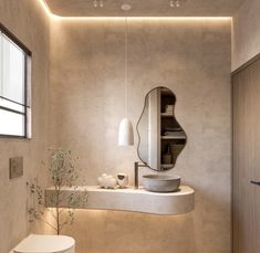 Japandi style bathroom with irregular wall mirror and limewash paint Balinese Bathroom, Wabi Sabi Bathroom, Balinese Interior, Wabi Sabi Interior, Salon Interior Design