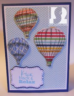 a card with three hot air balloons on it