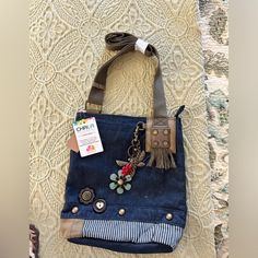 Chala Denim Crossbody Handbag. Nwt. Smoke Free And Pet Free Home! Includes The Dragonfly And Flowers Keychain. This Purse Allows You To Change The Keychain To Fit Your Style! Spring Denim Crossbody Bag, Casual Dark Wash Shoulder Bag With Adjustable Strap, Casual Bags With Adjustable Strap In Dark Wash, Casual Dark Wash Bag With Adjustable Strap, Casual Upcycled Denim Blue Bag, Casual Denim Blue Upcycled Bag, Dark Wash Travel Bag With Adjustable Strap, Casual Upcycled Tote Bag, Casual Denim Shoulder Bag For On-the-go