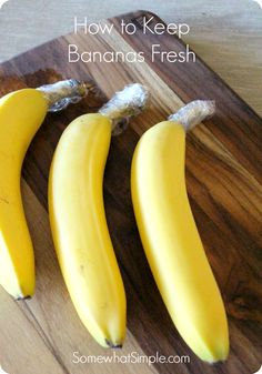 three bananas on a wooden cutting board with text overlay how to keep banana fresh