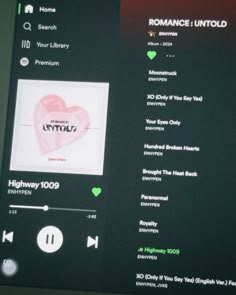 the music player is playing on the computer screen