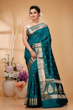 Elevate your ethnic wardrobe with this Exquisite Handwoven Banarasi Saree, a masterpiece of traditional Indian craftsmanship. Made from premium quality silk, this saree features intricate Zari work that showcases the rich cultural heritage of Banaras. Perfect for weddings, festivals, and special occasions, this Banarasi saree exudes elegance and sophistication. Each saree is meticulously handcrafted by skilled artisans, ensuring that every piece is unique and of the highest quality. The luxuriou Zari Work, Banarasi Saree, Satin Silk, Banarasi Sarees, Draped Fabric, Traditional Indian, Festival Wear, Blouse Piece, Formal Wear